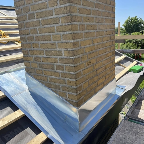 Zink inddækning ved skorsten