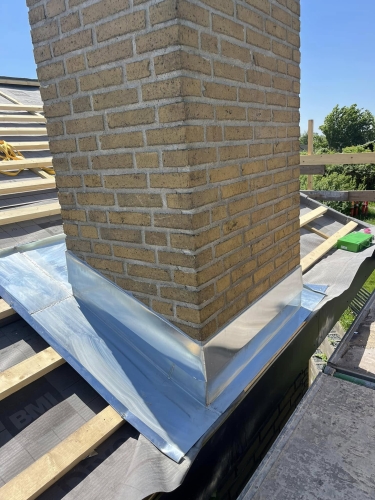 Zink inddækning ved skorsten